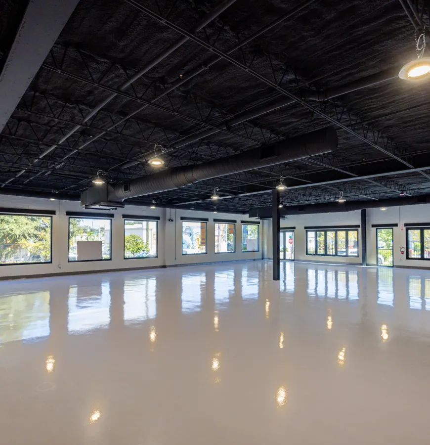 Adaptive flex industrial campus with high ceilings and open-span warehouse layout